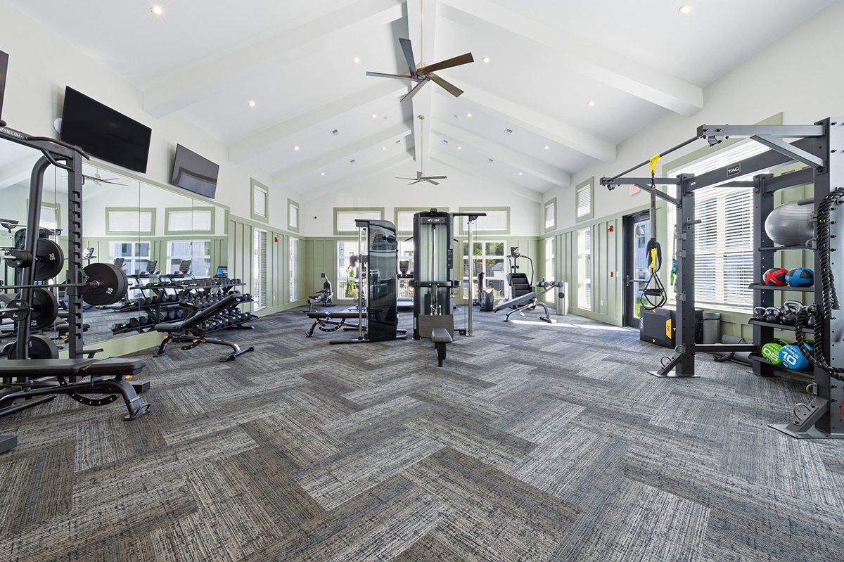 Crofthouse West Cobb fitness center with exercise machines and mirrors - Powder Springs, GA